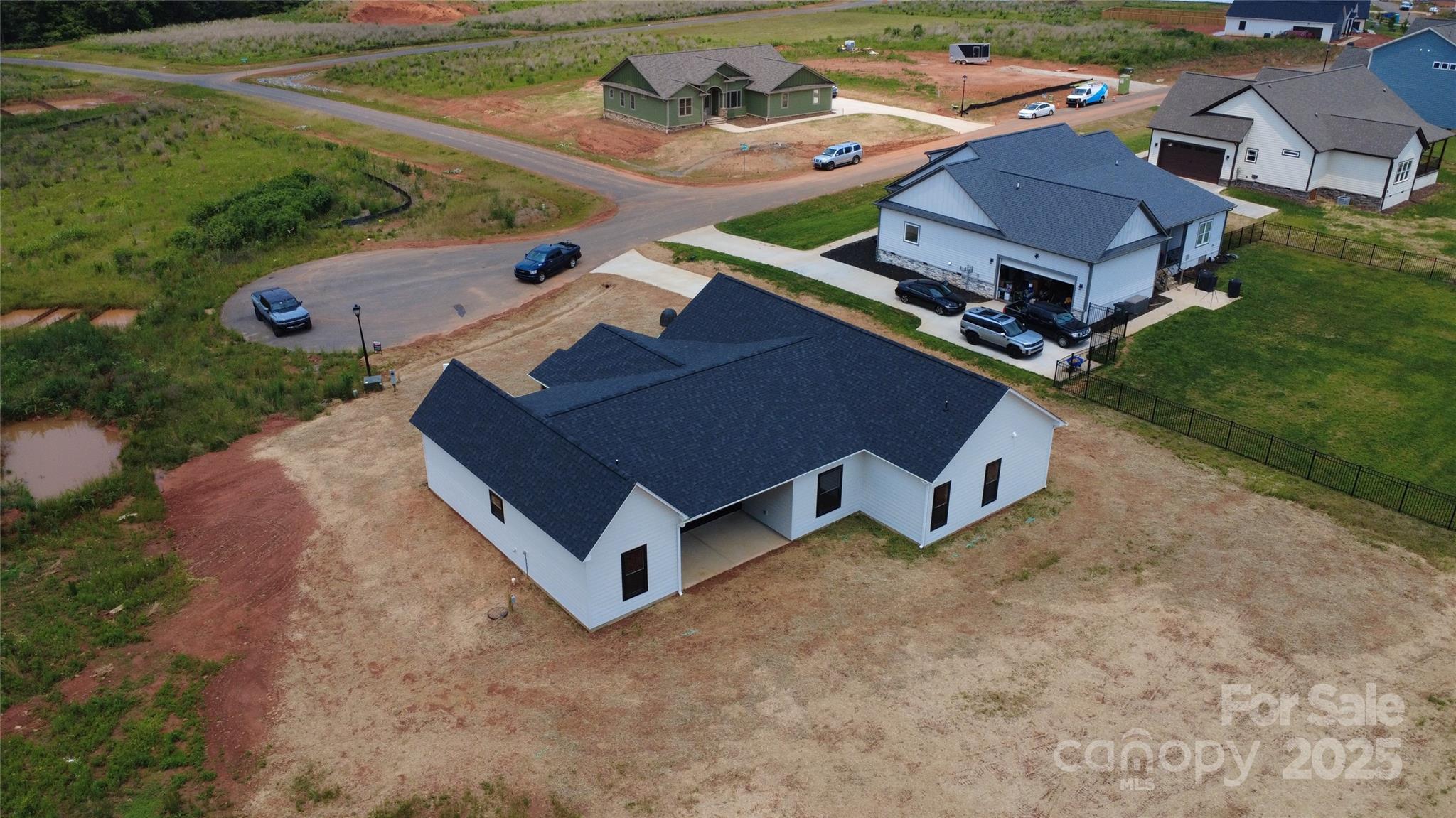 1429 Coppergate Drive Salisbury, NC 28147 - Photo 34 of 37 an aerial view of a house with a yard basket ball court and outdoor seating