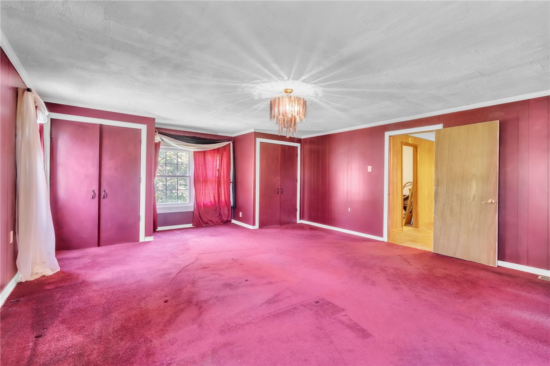 602 Harper Road Pendleton, SC 29670 - Photo 11 of 32 A spacious room features plush carpeting and multiple closets for ample storage.