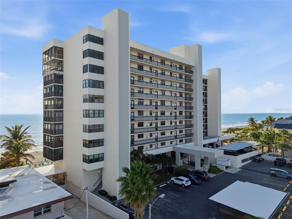 15462 Gulf Boulevard, Unit 406 Madeira Beach, FL 33708 - Photo 2 of 48 a city view with tall buildings