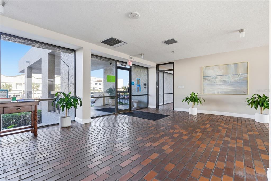 15462 Gulf Boulevard, Unit 406 Madeira Beach, FL 33708 - Photo 38 of 48 a view of a living room and dining room