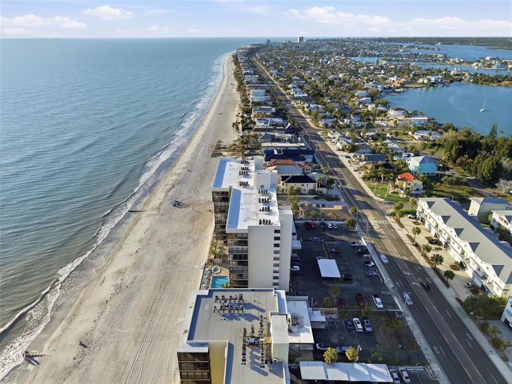 15462 Gulf Boulevard, Unit 406 Madeira Beach, FL 33708 - Photo 46 of 48 a city view with tall buildings