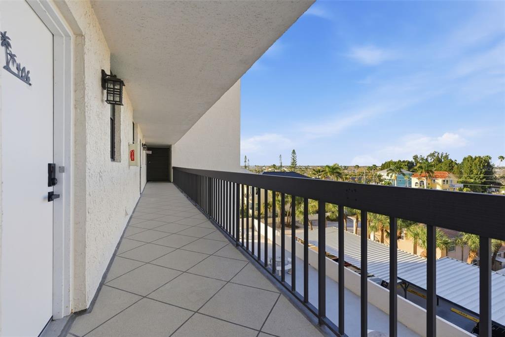 15462 Gulf Boulevard, Unit 406 Madeira Beach, FL 33708 - Photo 6 of 48 a view of a balcony with an outdoor space