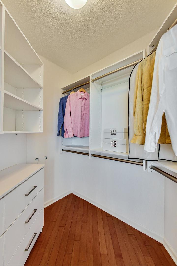 1720 Maple Avenue, Unit 2740 Evanston, IL 60201 - Photo 18 of 63 a view of a room with wooden floor and cabinet