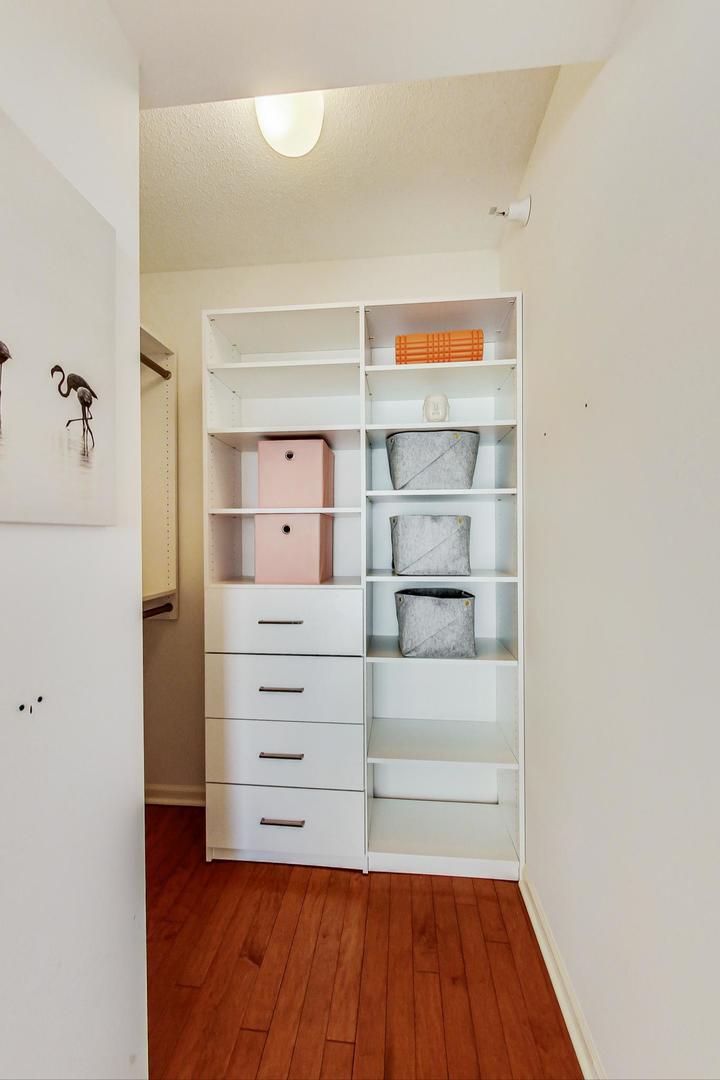 1720 Maple Avenue, Unit 2740 Evanston, IL 60201 - Photo 24 of 63 a view of walk in closet with empty racks