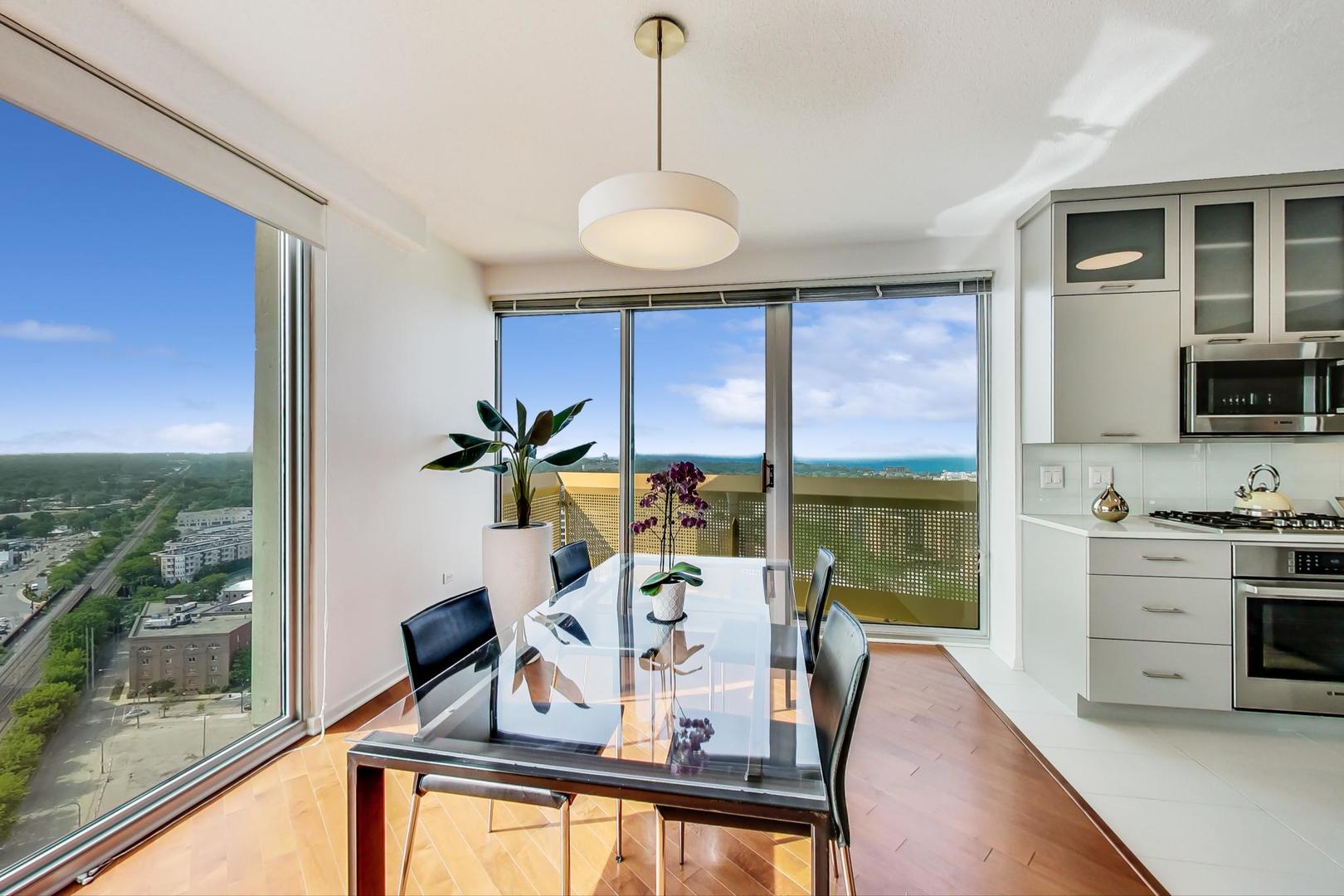 1720 Maple Avenue, Unit 2740 Evanston, IL 60201 - Photo 7 of 63 a view of a dining room with furniture window and outside view