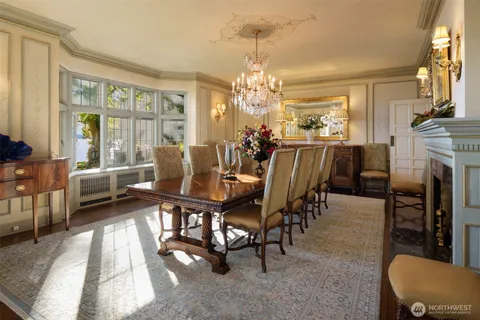 a view of a dining room with furniture window and outside view