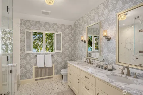 an aerial view of a house with yard swimming pool and outdoor seating