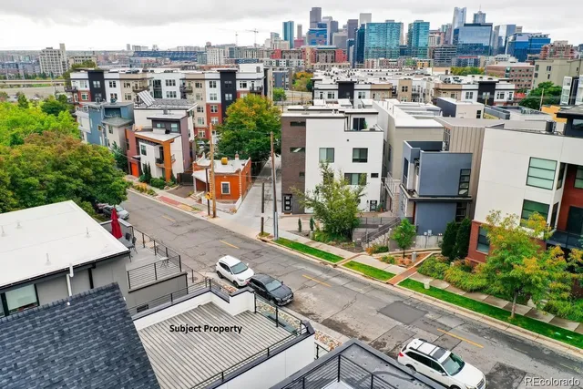 a view of a city with tall buildings