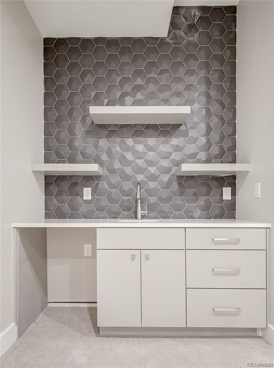 1811 West 32nd Avenue, Unit R Denver, CO 80211 - Photo 23 of 40 a view of white cabinets