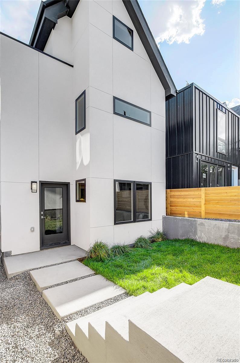 1811 West 32nd Avenue, Unit R Denver, CO 80211 - Photo 28 of 40 a view of a house with a swimming pool