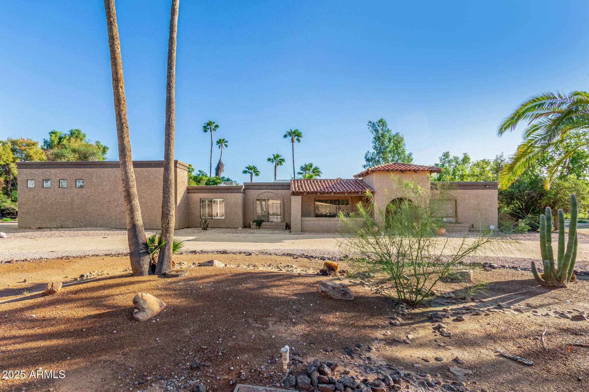 5739 East Cactus Road Scottsdale, AZ 85254 - Photo 2 of 52 a view of a street with an empty space