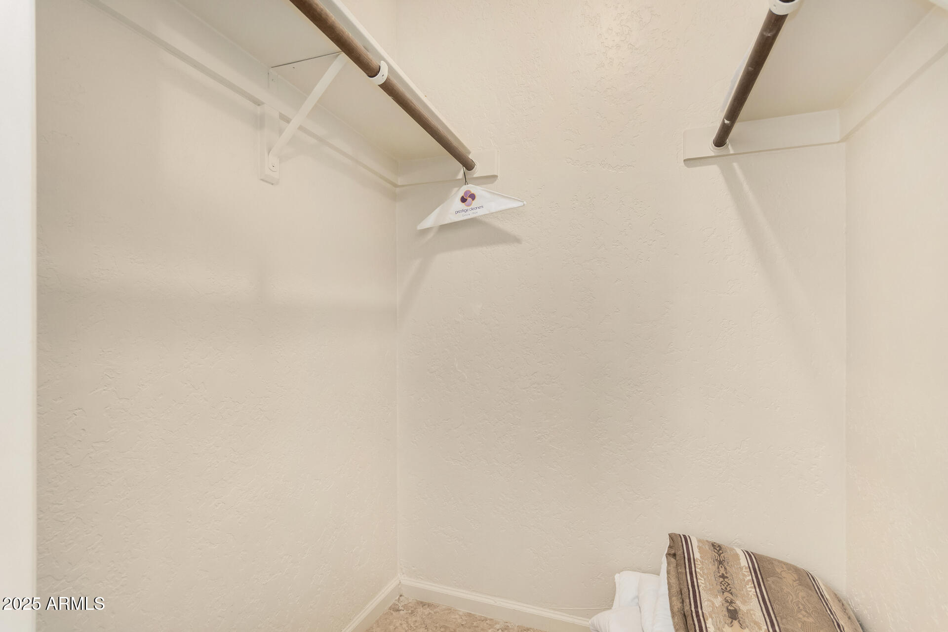 5739 East Cactus Road Scottsdale, AZ 85254 - Photo 29 of 52 a view of small space with racks on the wall