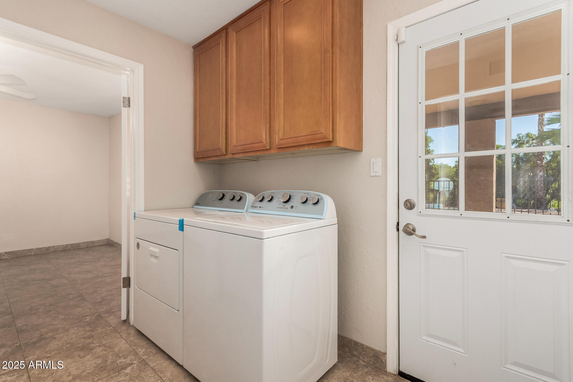 5739 East Cactus Road Scottsdale, AZ 85254 - Photo 38 of 52 a utility room with dryer and washer