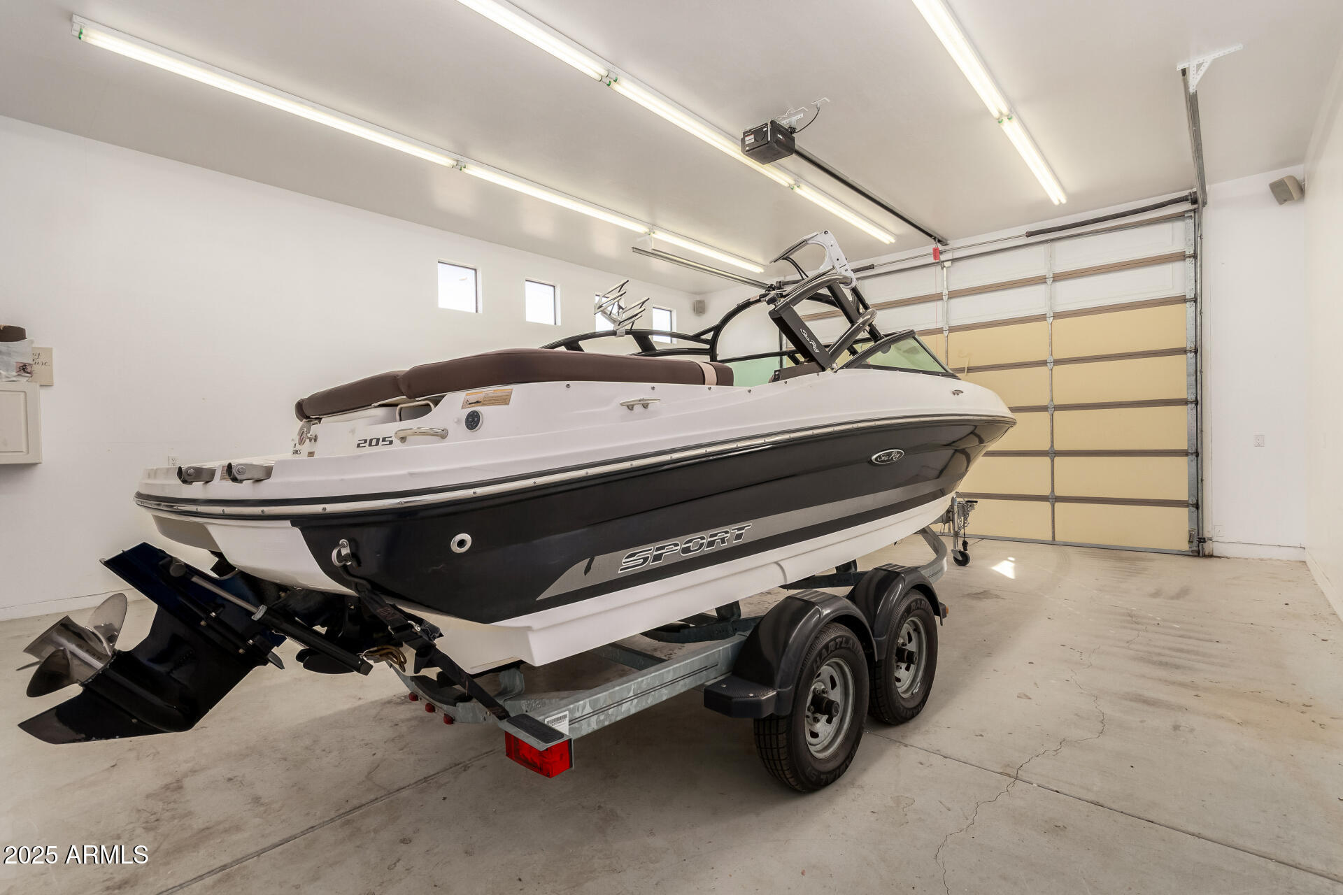 5739 East Cactus Road Scottsdale, AZ 85254 - Photo 39 of 52 a utility room with dryer and bicycles