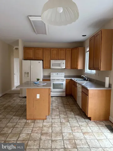 a view of empty room with windows