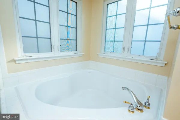 a bathroom with bathtub