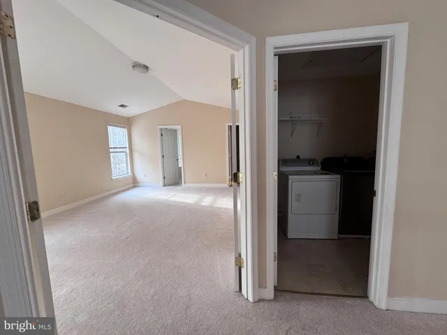 a white bath tub sitting next to a window