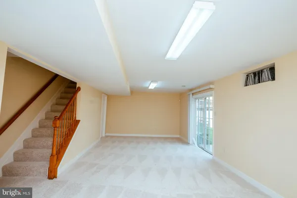 a view of an entryway with stairs