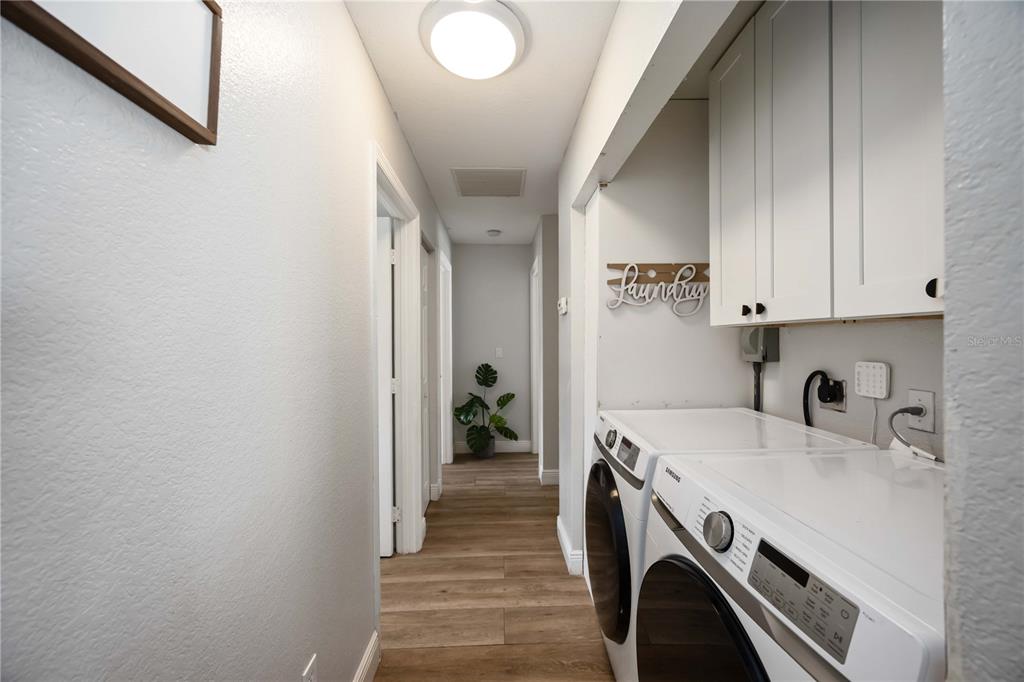 6775 Dennison Avenue North Port, FL 34287 - Photo 17 of 50 a utility room with dryer and washer