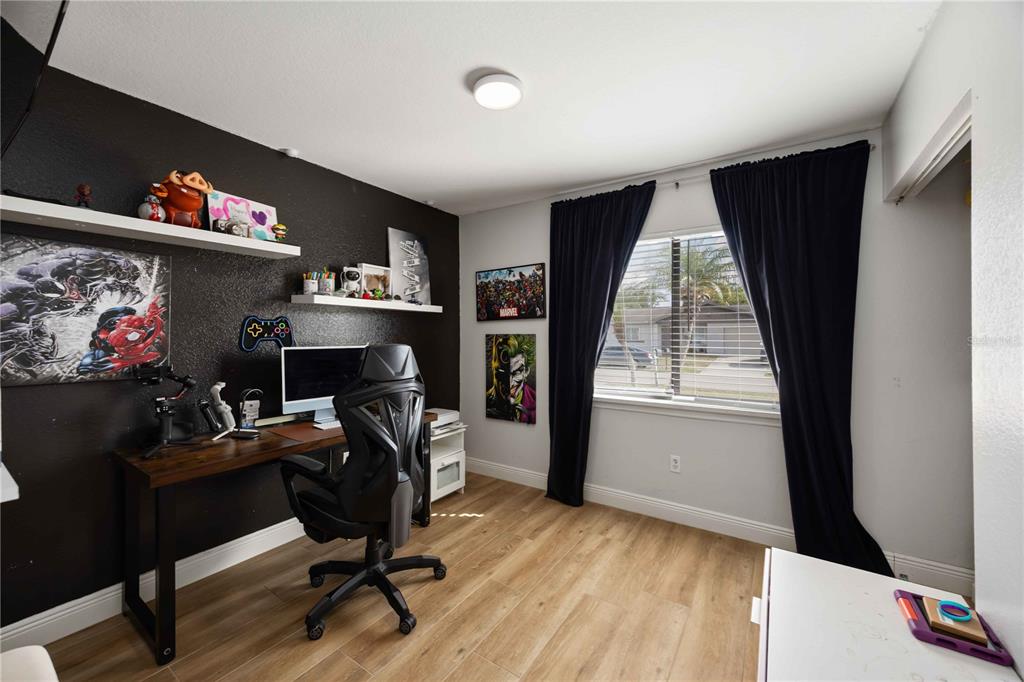 6775 Dennison Avenue North Port, FL 34287 - Photo 18 of 50 a view of a workspace with furniture and a window