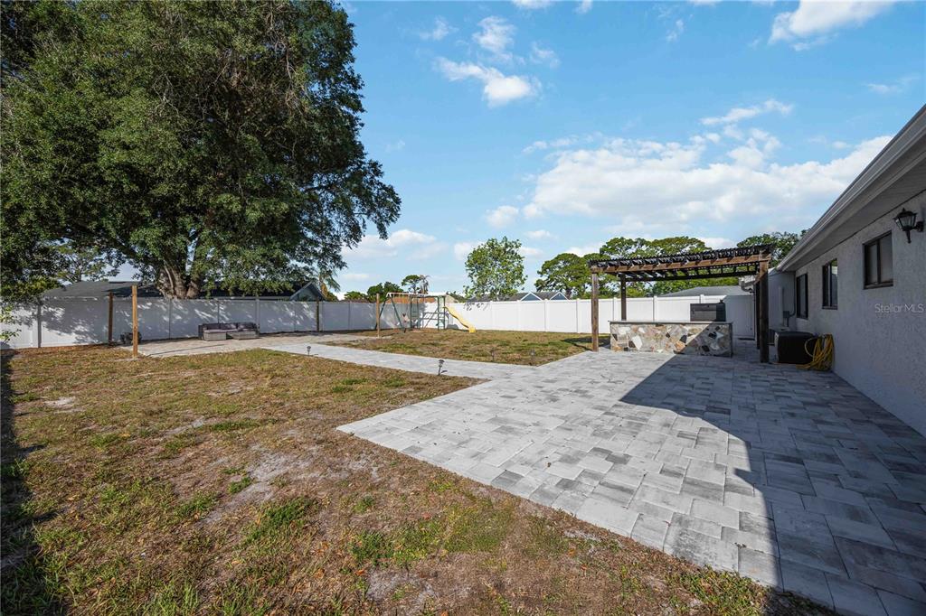 6775 Dennison Avenue North Port, FL 34287 - Photo 29 of 50 a view of a yard with swimming pool