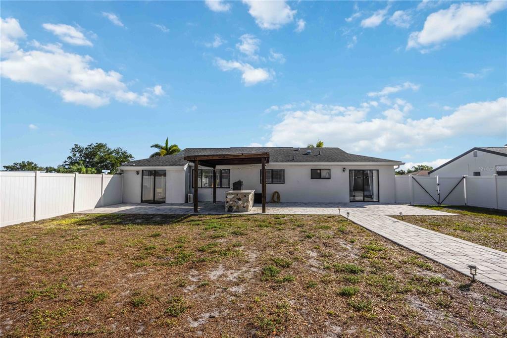6775 Dennison Avenue North Port, FL 34287 - Photo 32 of 50 a house view with a garden space
