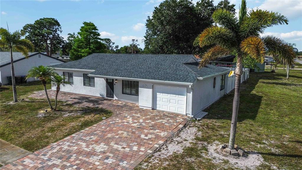 6775 Dennison Avenue North Port, FL 34287 - Photo 36 of 50 a view of a house with a yard