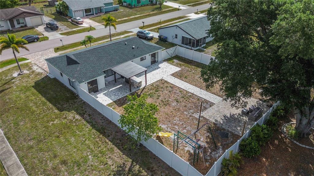 6775 Dennison Avenue North Port, FL 34287 - Photo 43 of 50 an aerial view of a house with a yard