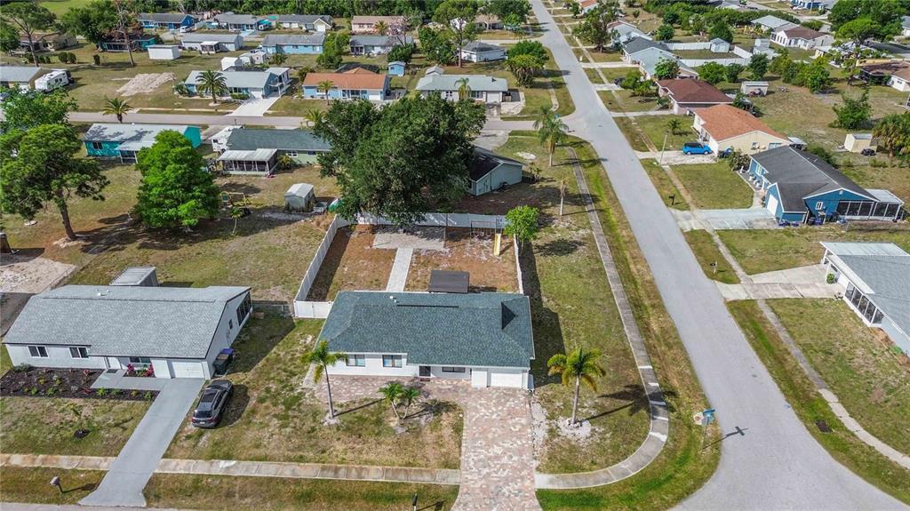 6775 Dennison Avenue North Port, FL 34287 - Photo 45 of 50 an aerial view of residential houses with yard