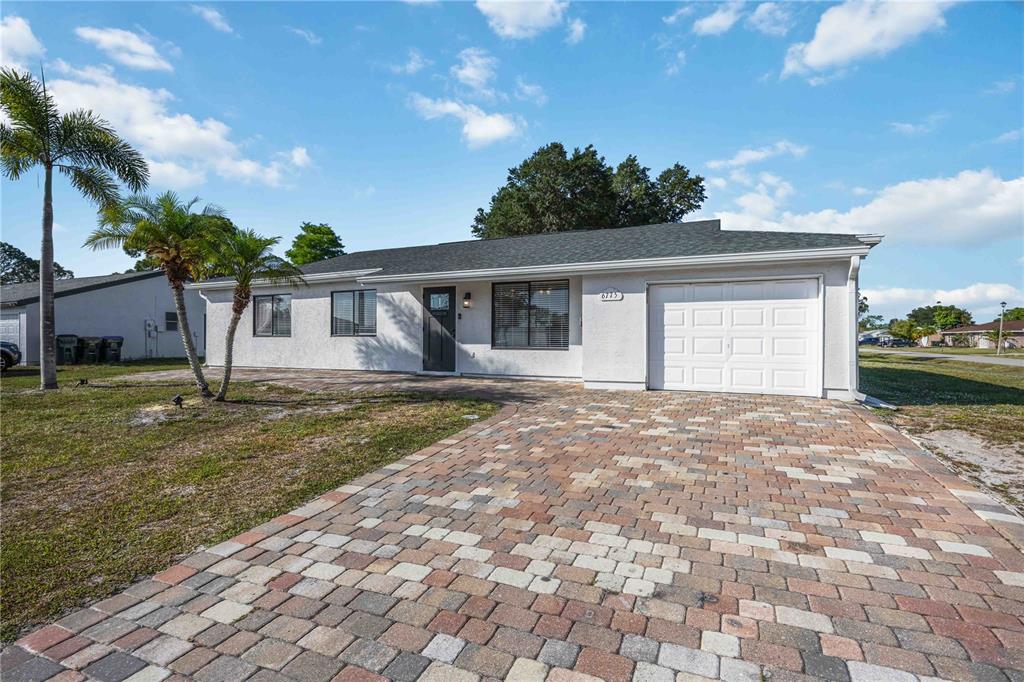 6775 Dennison Avenue North Port, FL 34287 - Photo 49 of 50 a house view with a backyard space