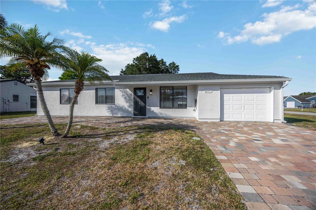 6775 Dennison Avenue North Port, FL 34287 - Photo 50 of 50 a view of a house with backyard and sitting area