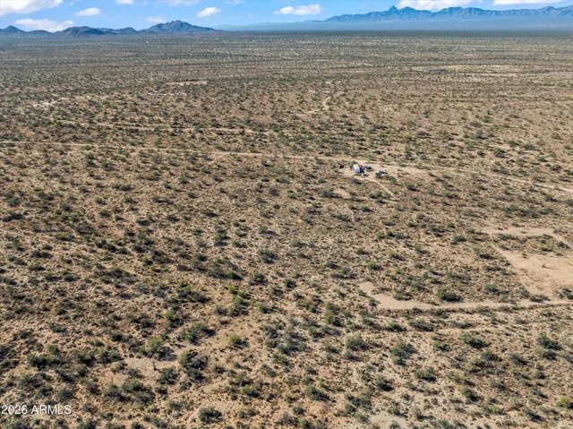 a view of an ocean from a yard