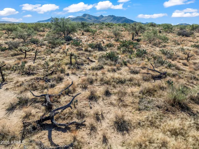 a view of a room with mountains and sky view