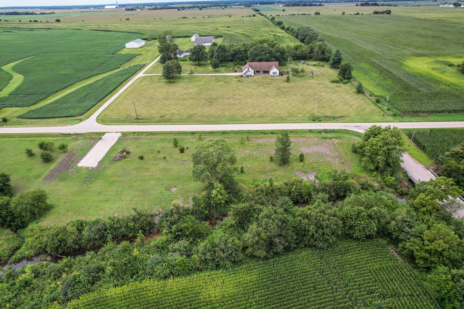 South County Road Newark, IL 60541 - Photo 3 of 8 a view of a swimming pool and a yard