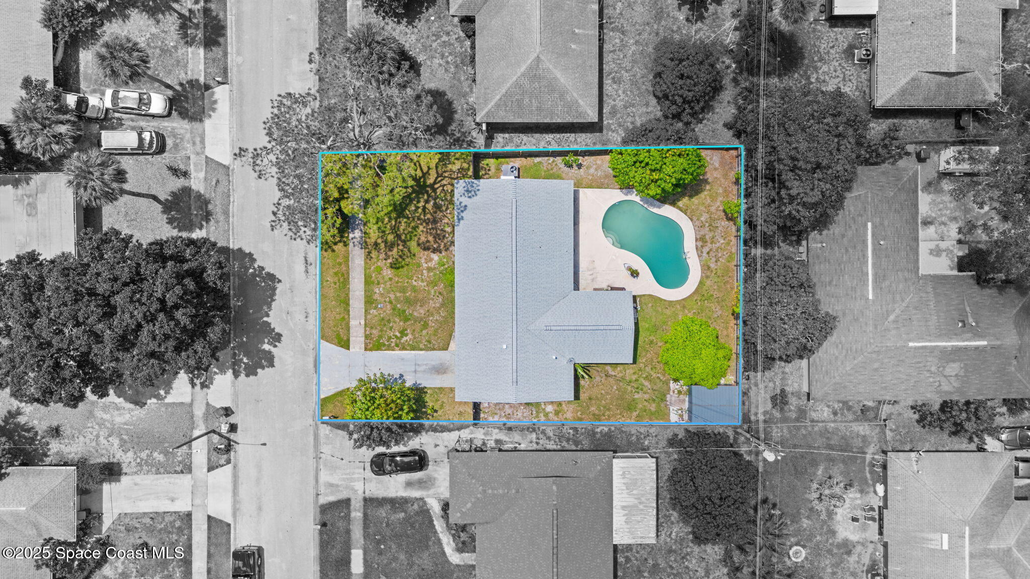 1044 Pompano Drive Rockledge, FL 32955 - Photo 2 of 28 an aerial view of a house with a swimming pool