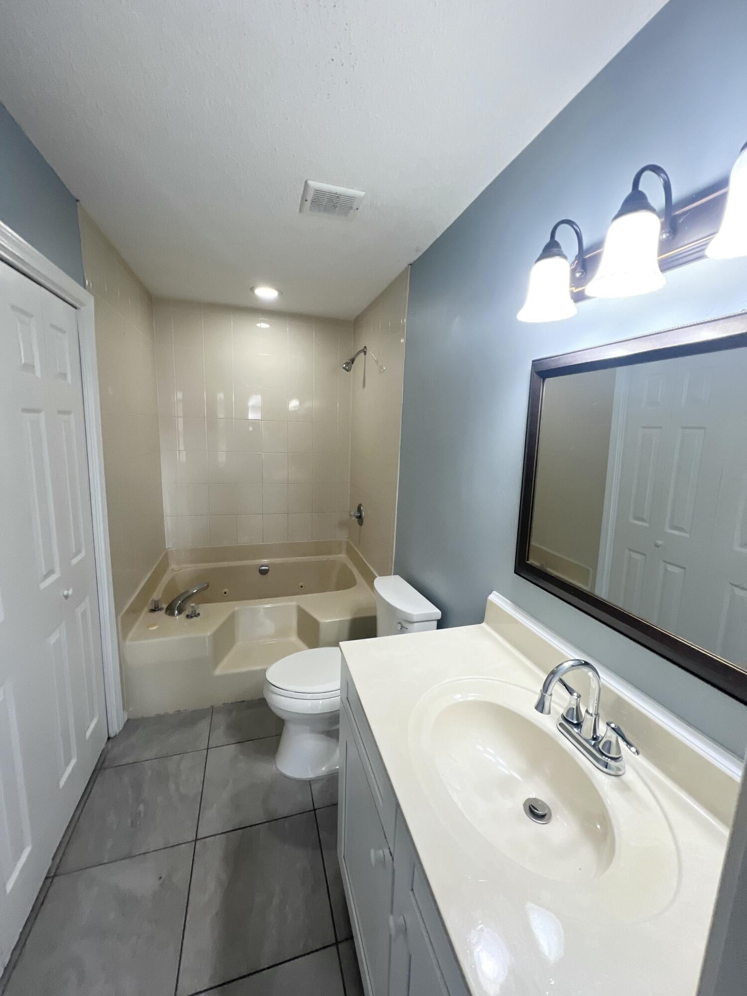 3429 Melissa Lane Crestview, FL 32539 - Photo 13 of 28 a bathroom with a sink and a mirror