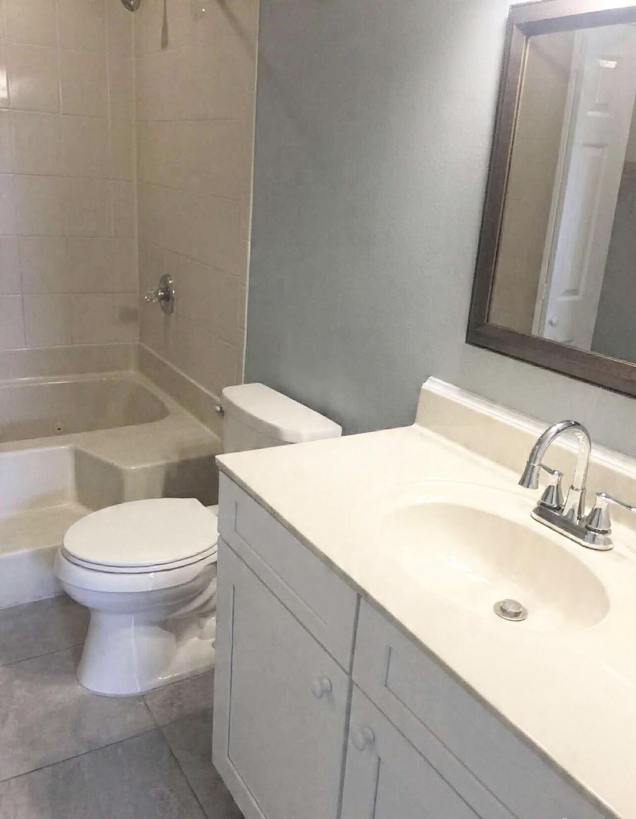 3429 Melissa Lane Crestview, FL 32539 - Photo 14 of 28 a bathroom with a sink and a mirror