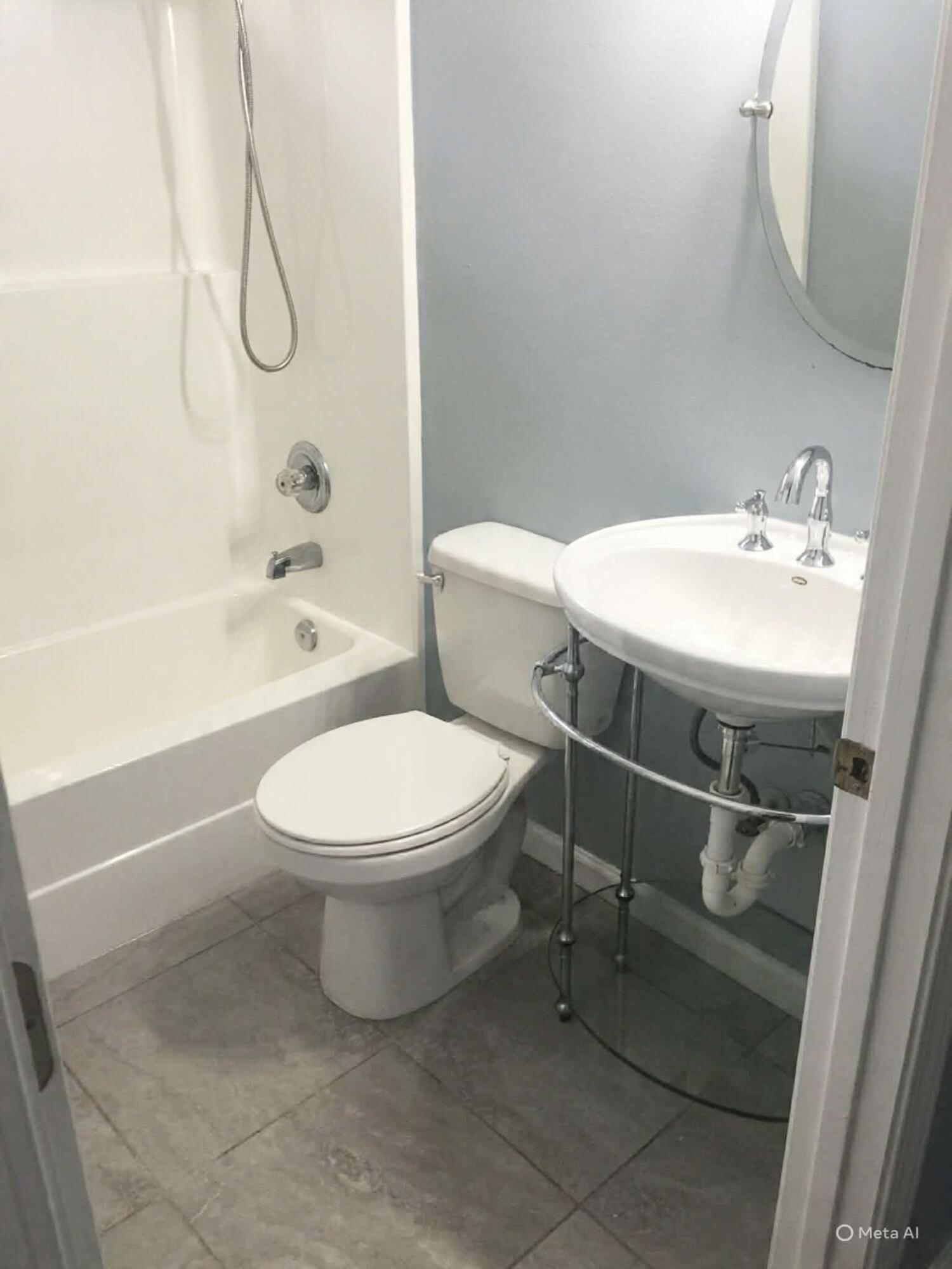 3429 Melissa Lane Crestview, FL 32539 - Photo 19 of 28 a bathroom with a toilet sink and shower