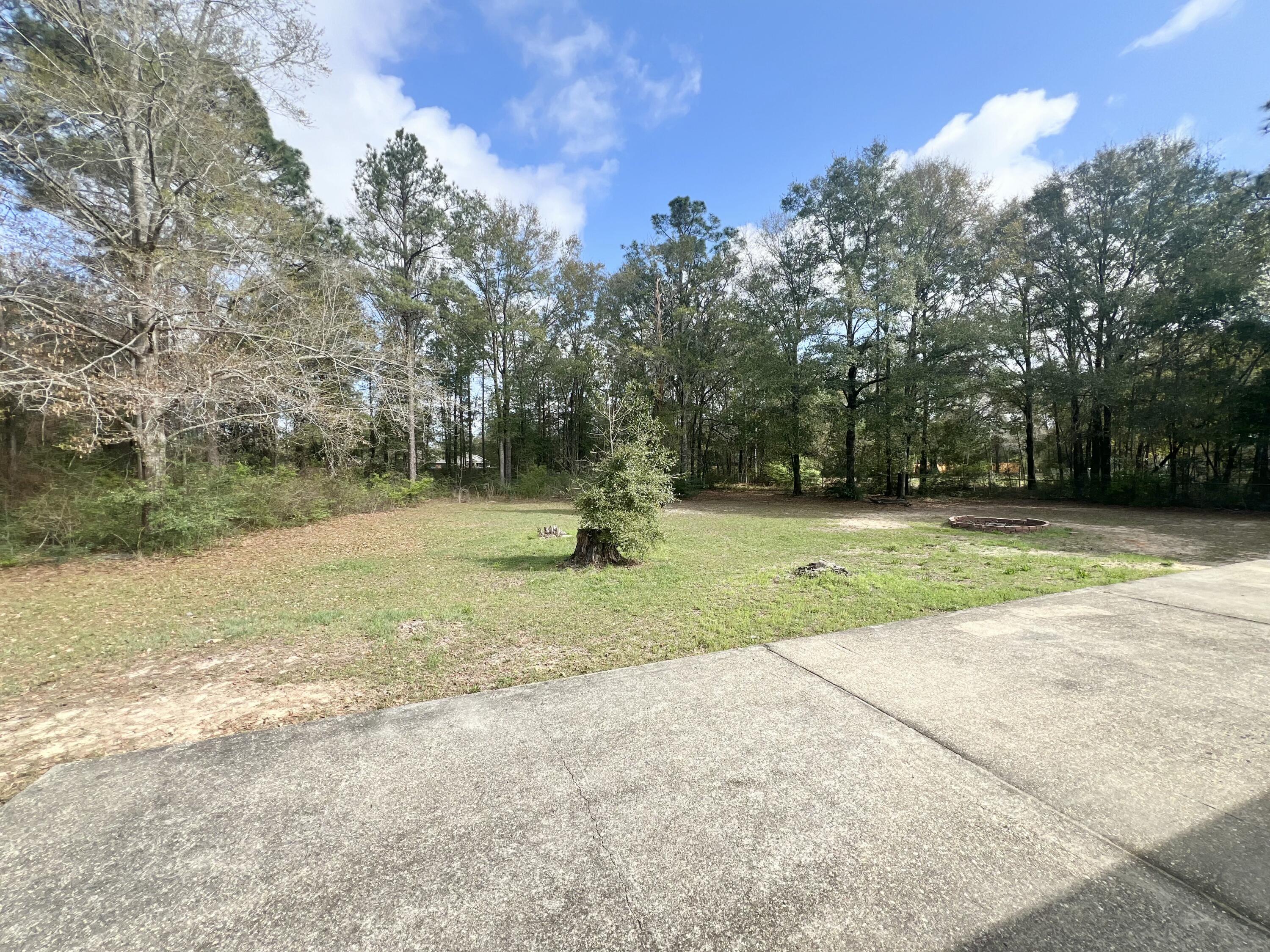 3429 Melissa Lane Crestview, FL 32539 - Photo 25 of 28 a view of a park with large trees