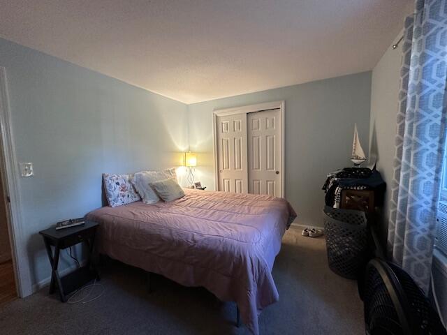 89 Mitchells Way Hyannis, MA 02601 - Photo 23 of 33 a bedroom with a bed and a closet