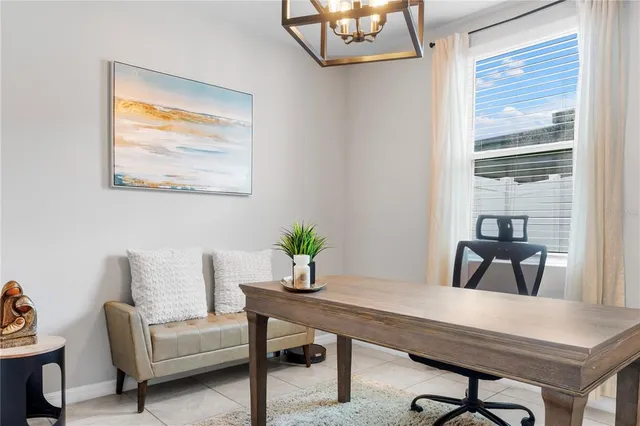 a view of a livingroom with furniture and window
