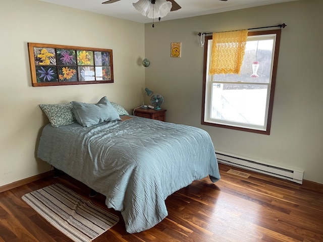 2365 West Southmor Road Morris, IL 60450 - Photo 11 of 25 a bedroom with a bed and wooden floor