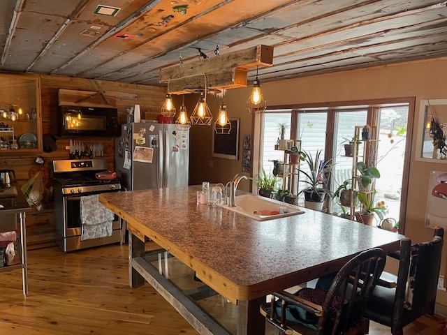 2365 West Southmor Road Morris, IL 60450 - Photo 12 of 25 a dining table with chairs and wooden floor