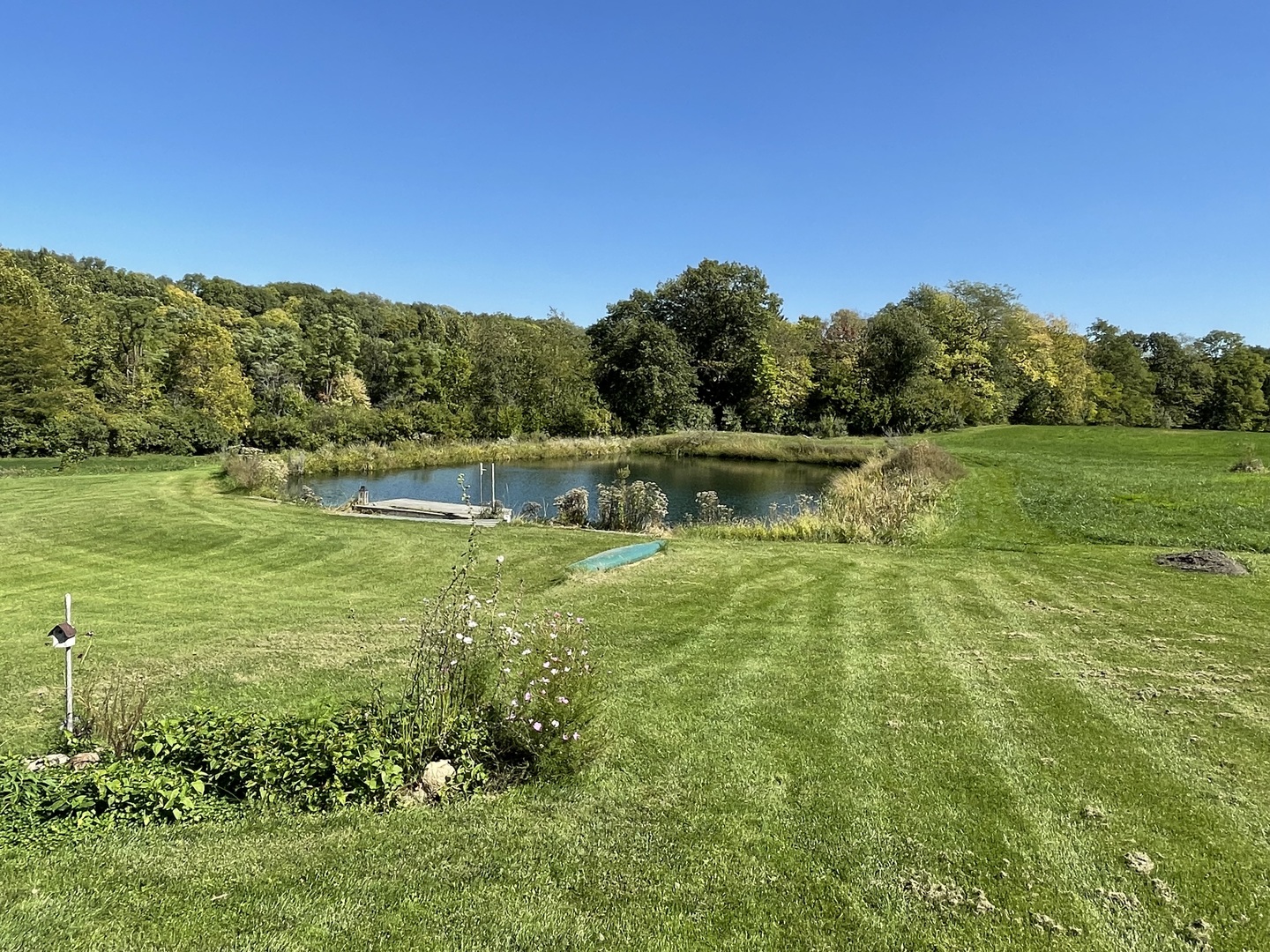 2365 West Southmor Road Morris, IL 60450 - Photo 8 of 25 a view of a lake with houses in the background