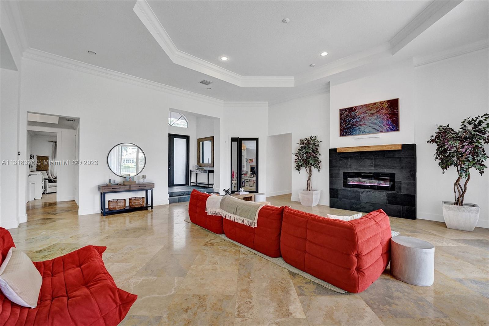 Davie Davie, FL 33331 - Photo 19 of 84 a living room with furniture fireplace and a flat screen tv