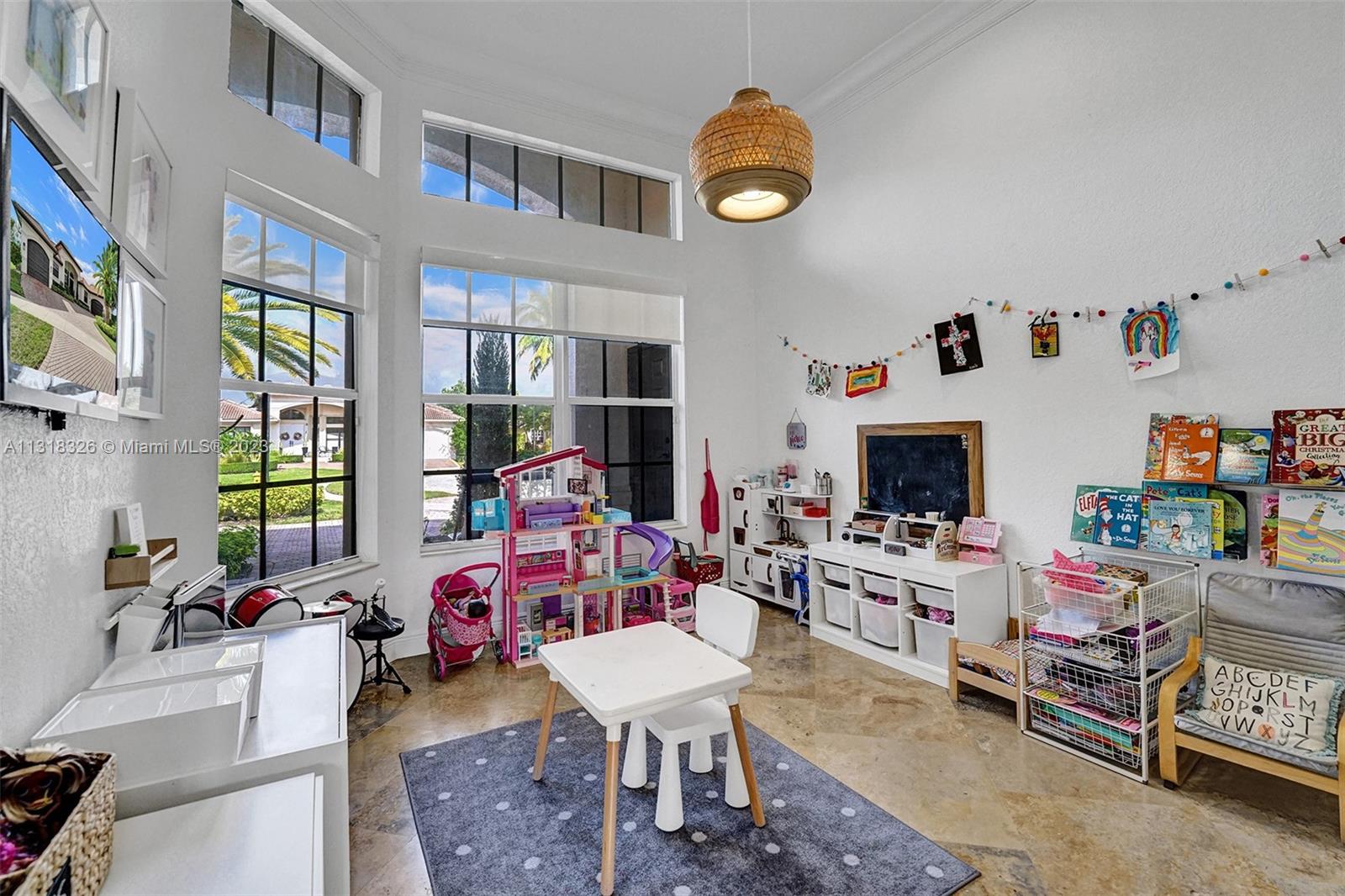 Davie Davie, FL 33331 - Photo 27 of 84 a living room with furniture and a flat screen tv
