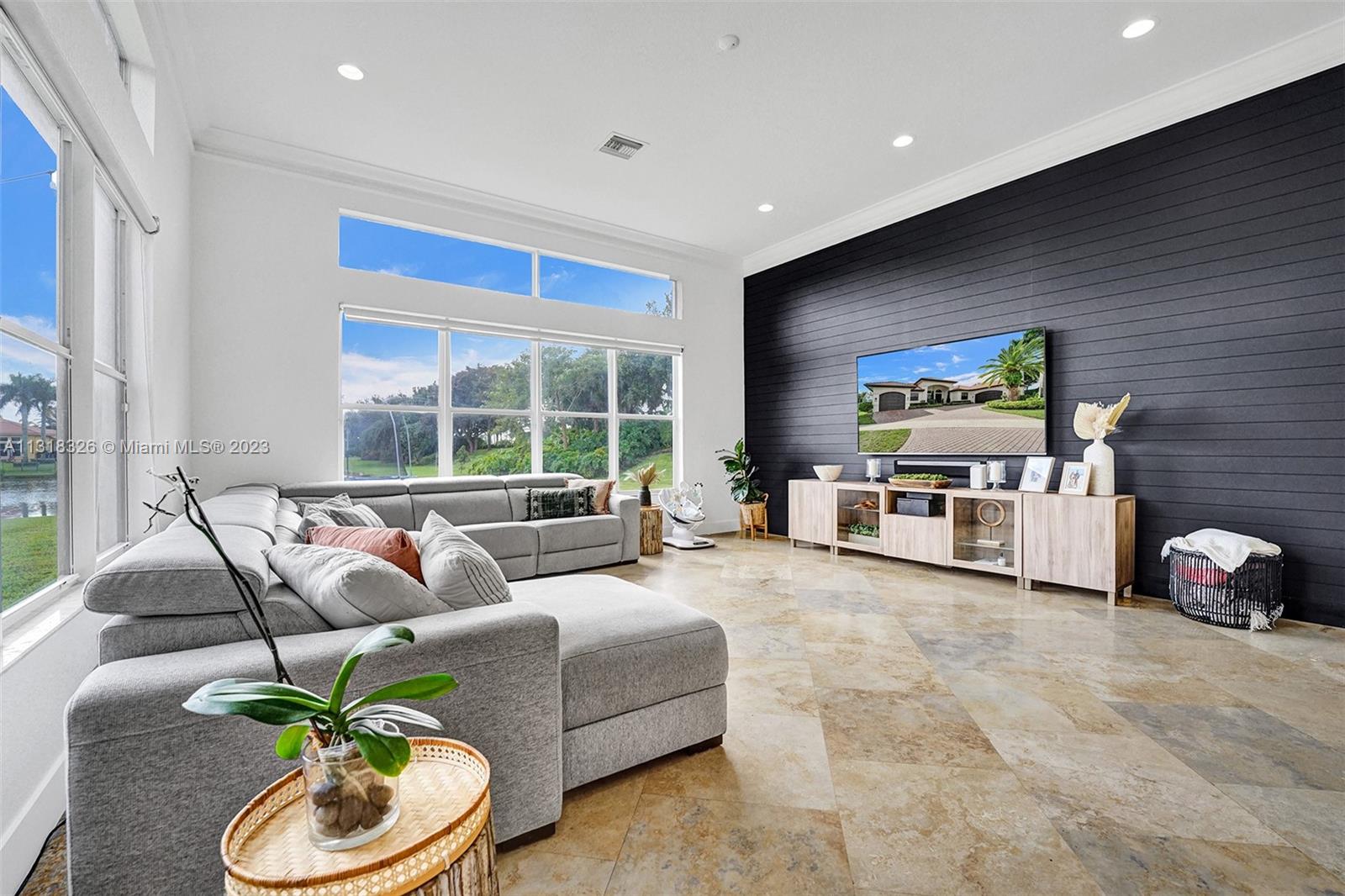 Davie Davie, FL 33331 - Photo 38 of 84 a living room with furniture and a flat screen tv