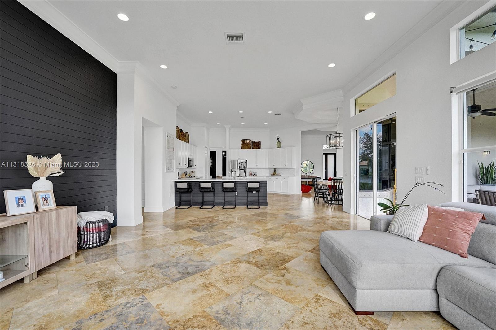 Davie Davie, FL 33331 - Photo 40 of 84 a living room with furniture and a table
