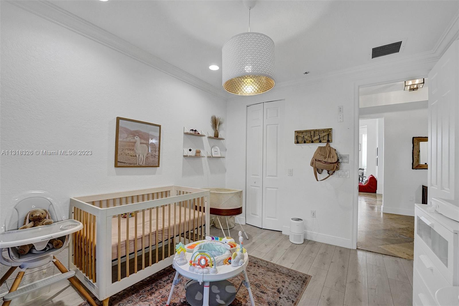 Davie Davie, FL 33331 - Photo 51 of 84 a bedroom with furniture and a wooden floor