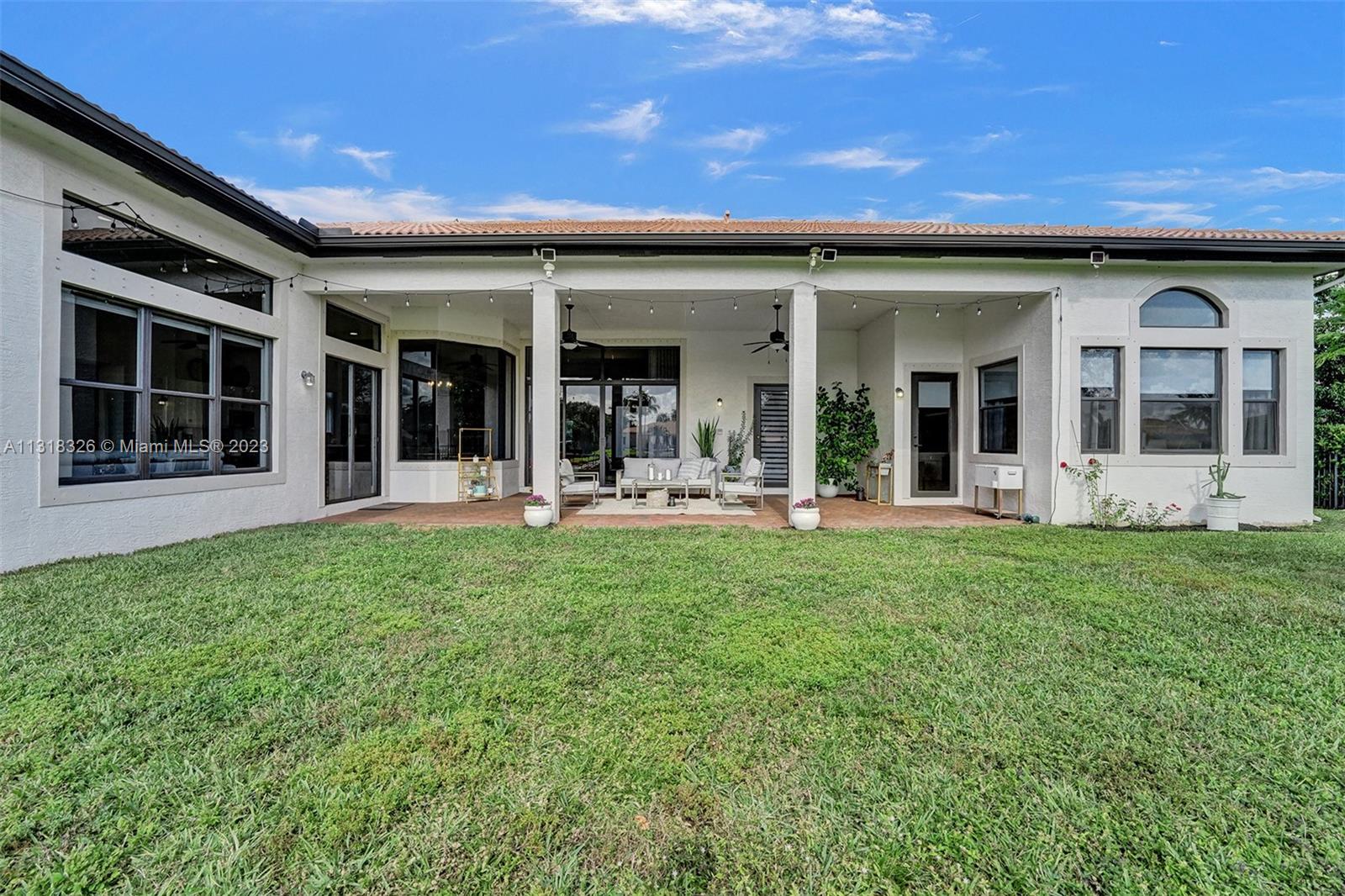 Davie Davie, FL 33331 - Photo 77 of 84 front view of a house with a yard